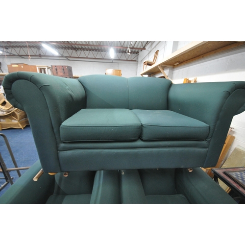 1373 - A GREEN UPHOLSTERED THREE PIECE LOUNGE SUITE, comprising a two seater settee, and a pair of armchair... 