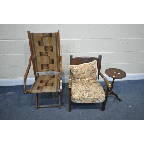 1374 - AN EARLY 20TH CENTURY FOLDING ARMCHAIR, with a fabric seat, a beech armchair, with a leatherette bac... 