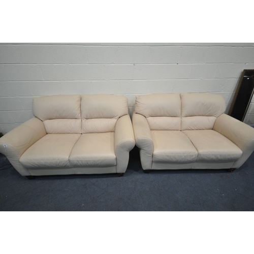 1377 - A PAIR OF CREAM LEATHERETTE TWO SEATER SOFAS, length 155cm (condition - signs of wear and dirt)