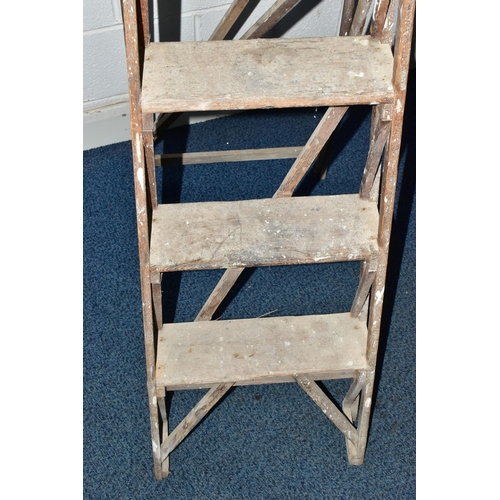 742A - A SET OF VINTAGE WOODEN STEP LADDERS, bearing cast iron 'TRADE MARK CAJAC' mounts to both sides, clo... 