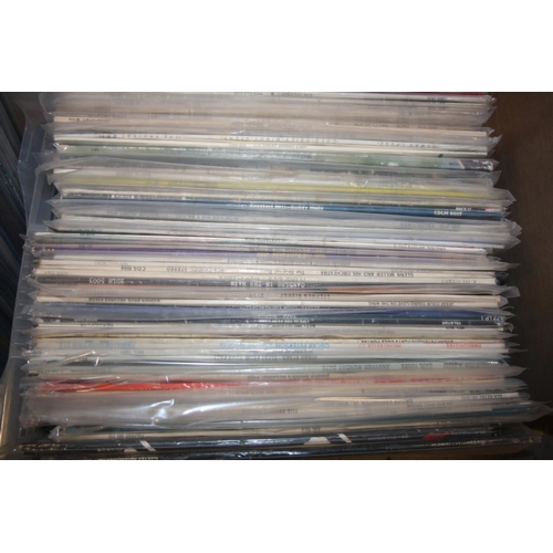 812 - TWO TRAYS CONTAINING OVER ONE HUNDRED AND THIRTY LPs including U2, Santana, Louis Armstrong, Peter F... 