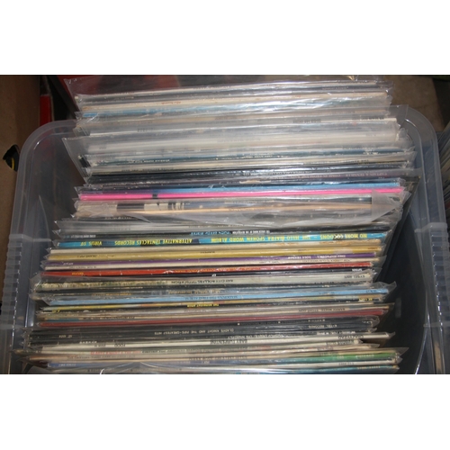 812 - TWO TRAYS CONTAINING OVER ONE HUNDRED AND THIRTY LPs including U2, Santana, Louis Armstrong, Peter F... 