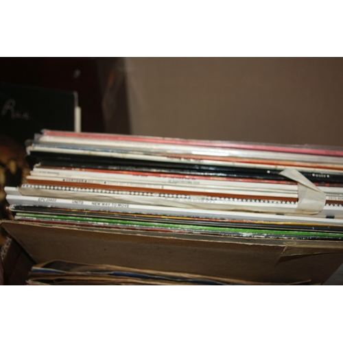 831 - A CASE AND A TRAY CONTAINING OVER FIFTY LPs, twenty 78s, seventy single and six cassette tapes inclu... 