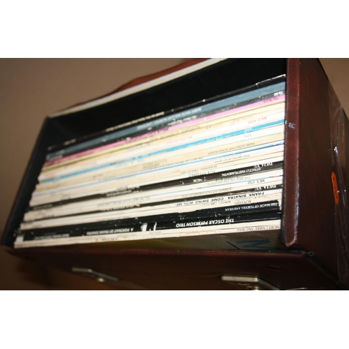 831 - A CASE AND A TRAY CONTAINING OVER FIFTY LPs, twenty 78s, seventy single and six cassette tapes inclu... 