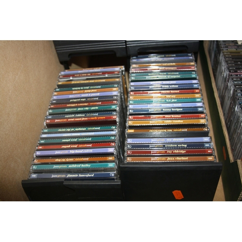 834 - A TRAY AND A DRAWER UNIT CONTAINING SEVENTY SEVEN JAZZ GREATS CDs, 107 The Classic Collection CDs an... 