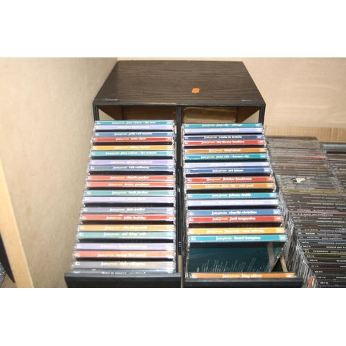 834 - A TRAY AND A DRAWER UNIT CONTAINING SEVENTY SEVEN JAZZ GREATS CDs, 107 The Classic Collection CDs an... 