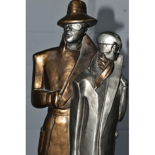 841A - A LATE 20TH CENTURY AUSTIN PROD INC PLASTER SCULPTURE OF AN ART DECO STYLE LADY AND GENTLEMAN, gilt ... 