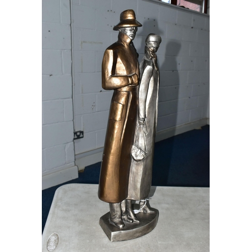 841A - A LATE 20TH CENTURY AUSTIN PROD INC PLASTER SCULPTURE OF AN ART DECO STYLE LADY AND GENTLEMAN, gilt ... 