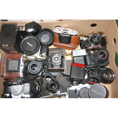 852 - FOUR TRAYS CONTAINING CAMERAS, LENSES AND PHOTOGRAPHIC EQUIPMENT including Praktica MTL3, LB and a P... 