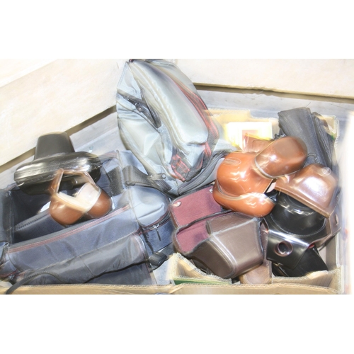 853 - THREE TRAYS CONTAINING CAMERA AND PHOTOGRAPHIC EQUIPMENT including a Pentax ME, Canon FT QL and FX, ... 