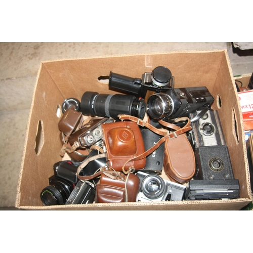 856 - FOUR TRAYS CONTAINING CAMERAS AND EQUIPMENT including a Nikon F50 with 28-70mm lens, a Voigtlander V... 