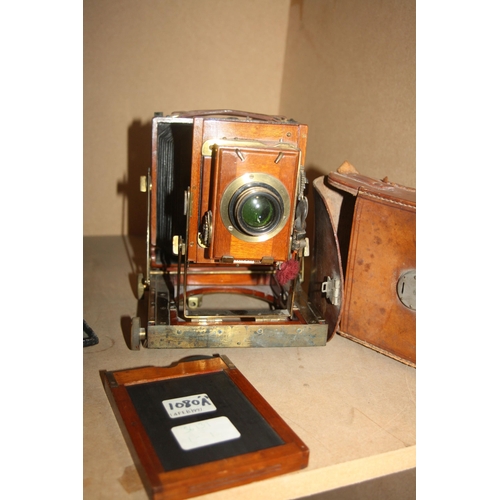 861 - A THORNTON PICKARD IMPERIAL FIELD CAMERA with mahogany and brass construction, an Aldis Anastigmat F... 