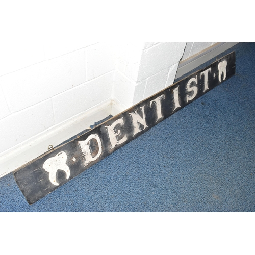 863A - A 19TH CENTURY WOODEN BOARD LATER PAINTED AS A 'DENTIST' SIGN, with applied wooden tooth to either e... 