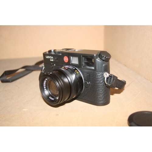 865 - A LEICA M6 FILM CAMERA serial No 2755787 in black fitted with a Semikron M 50mm f2 lens with cap and... 