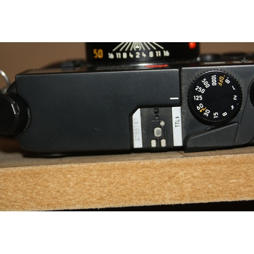 865 - A LEICA M6 FILM CAMERA serial No 2755787 in black fitted with a Semikron M 50mm f2 lens with cap and... 