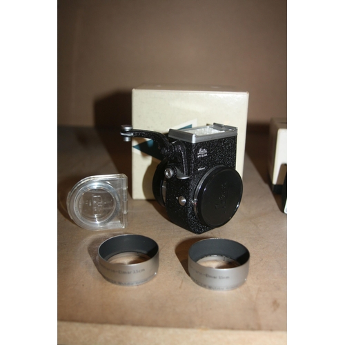 873 - A COLLECTION OF ERNST LEITZ AND LEICA ACCESSORIES including a boxed Visoflex 2, a boxed 16460T prism... 