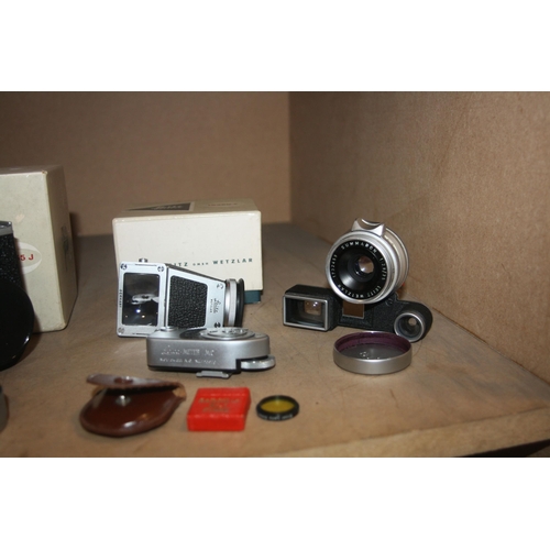 873 - A COLLECTION OF ERNST LEITZ AND LEICA ACCESSORIES including a boxed Visoflex 2, a boxed 16460T prism... 