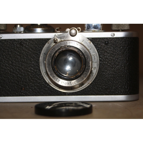 879 - A 1931 LEICA 1 FILM CAMERA Serial No 61925 fitted with a Hektor 5cm f2.5 lens Condition shutter fire... 