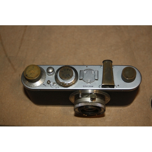 879 - A 1931 LEICA 1 FILM CAMERA Serial No 61925 fitted with a Hektor 5cm f2.5 lens Condition shutter fire... 