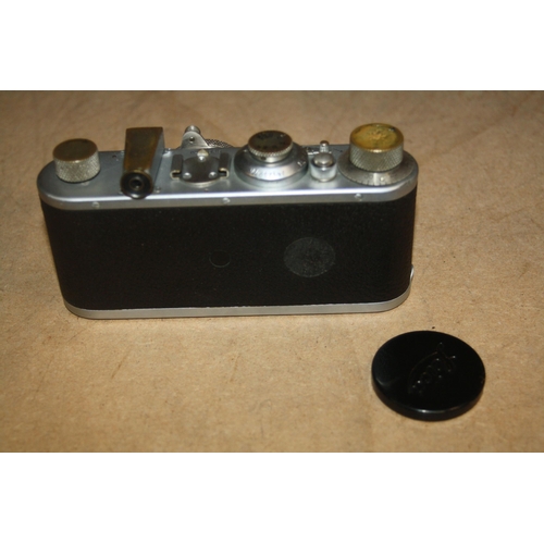 879 - A 1931 LEICA 1 FILM CAMERA Serial No 61925 fitted with a Hektor 5cm f2.5 lens Condition shutter fire... 