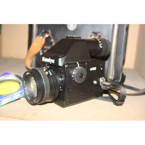 881 - A MAMIYA M645E MEDIUM FORMAT CAMERA fitted with a Secor C 80mm f2.8 lens, three filters and a case C... 