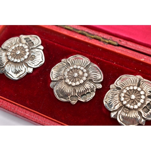 881A - A CASED SET OF SIX EDWARDIAN SILVER BUTTONS IN THE FORM OF A FLOWERHEAD, makers Goldsmiths & Silvers... 