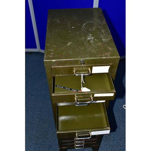 883A - A METAL CHEST OF FIFTEEN FILING DRAWERS, painted green with chrome pull handles, on four short legs,... 