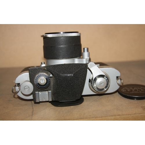 887 - A PIGNONS ALPA 9D REFLEX SLR CAMERA in chrome Serial no 46667 fitted with a Switar 50mm f1.8 lens an... 