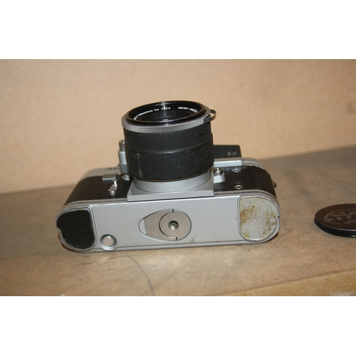 887 - A PIGNONS ALPA 9D REFLEX SLR CAMERA in chrome Serial no 46667 fitted with a Switar 50mm f1.8 lens an... 