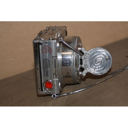 888 - A Le COUTRE COMPASS MINIATURE CAMERA with an Anastigmat 35mm f3.5lens Serial No 3028