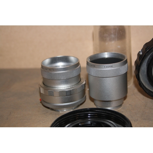 891 - TWO LEICA ELMAR 9cm f 4 LENSES extension tube and adapter