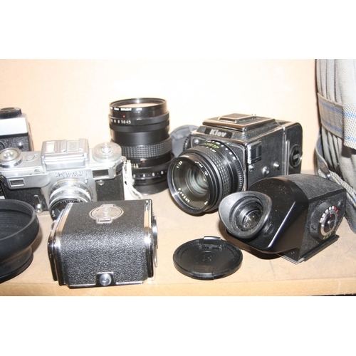 893 - A KIEV 88 MEDIUM FORMAT CAMERA fitted with a 80mm f2.8 lens, a 55mm f4.5 lens, a prismatic viewer, f... 