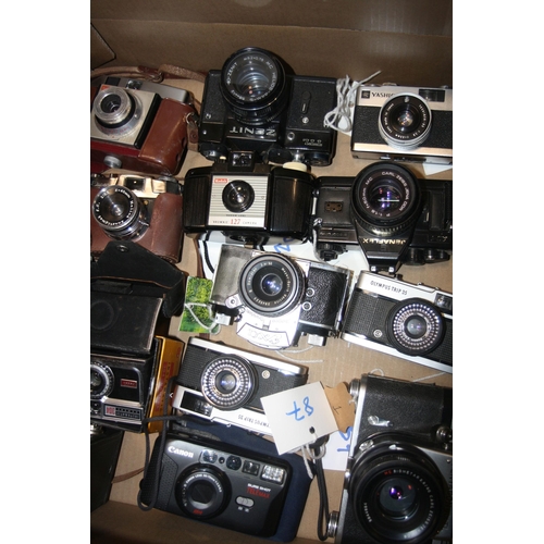 895 - A TRAY CONTAINING THIRTEEN VINTAGE FILM CAMERAS including a Pentacon Six TL fitted with a Biometar 8... 