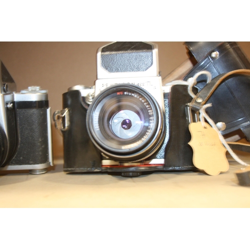 896 - TWO PENTACON SIX TL FILM CAMERAS both with Biometar 80mm f2.8 lens and one with leather case and two... 