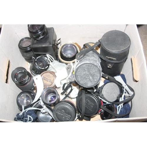 906 - TWO TRAYS CONTAINING AFTERMARKET LENSES , six tripods and two cine cameras including Vivitar 28-105m... 