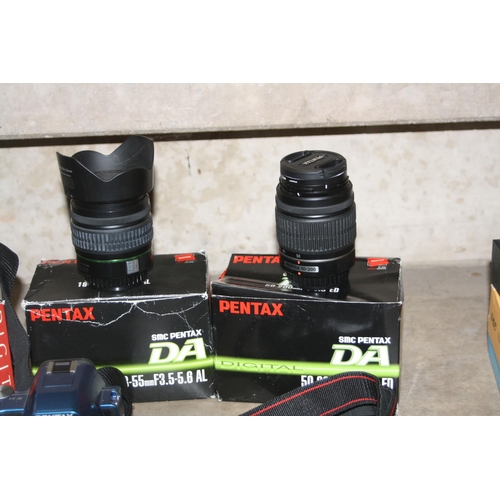 909 - A TRAY CONTAINING PENTAX DIGITAL CAMERAS comprising of a K-Si SR with a 50-200mm f4 lens, a boxed 50... 