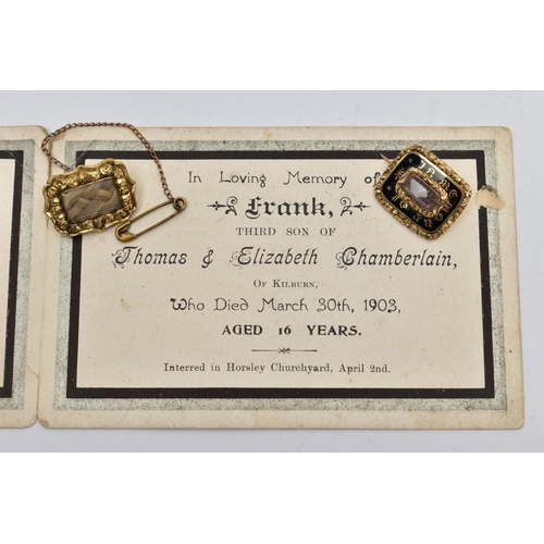 910A - TWO EARLY 20TH CENTURY MEMORIAL BROOCHES, the first a gold brooch, rectangular form, a central glass... 