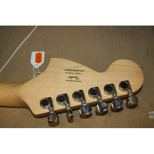 929 - A 2005 SQUIER STARTOCASTER mad in Indonesia, with tobacco sunburst finish, off white scratch plate, ... 