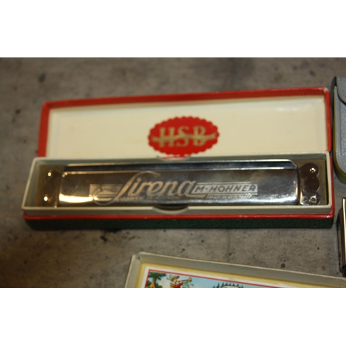 938 - THREE HOHNER HARMONICAS comprising of a boxes Super Vamper, a boxed Echo and a boxed Sirena