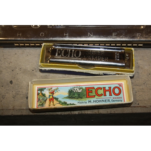 938 - THREE HOHNER HARMONICAS comprising of a boxes Super Vamper, a boxed Echo and a boxed Sirena