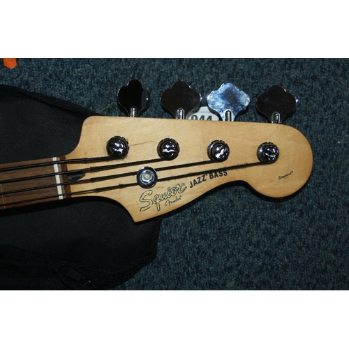 944 - A 2005 SQUIER JAZZ BASS professionally de fretted with natural walnut coloured body, maple neck rose... 