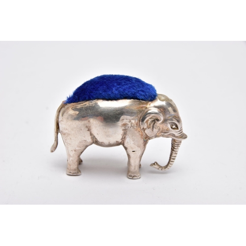 946A - AN EDWARDIAN SILVER PIN CUSHION IN THE FORM OF A STANDING ELEPHANT, makers Adie & Lovekin Ltd, Birmi... 