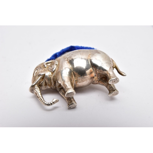 946A - AN EDWARDIAN SILVER PIN CUSHION IN THE FORM OF A STANDING ELEPHANT, makers Adie & Lovekin Ltd, Birmi... 