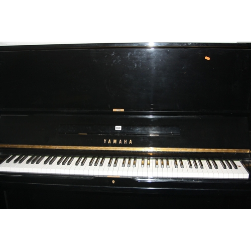 950 - A YAMAHA U3 UPRIGHT PIANO in gloss black, Serial No H2177425, Condition very good apart from a scuff... 