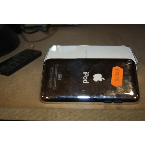 953 - A TRAY CONTAINING AN APPLE iPOD TOUCH with box, 8Gb capacity, model No A1367 and a JBL On Flip 3P do... 