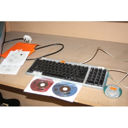 956 - AN APPLE iMAC M5521 PERSONAL COMPUTER with keyboard and mouse along with Software Restore, Software ... 