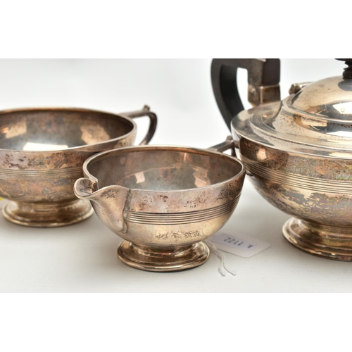 152 - A GEORGE V SILVER THREE PIECE BACHELOR'S TEA SET OF CIRCULAR FORM, with shallow concentric horizonta... 