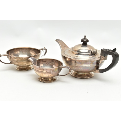 152 - A GEORGE V SILVER THREE PIECE BACHELOR'S TEA SET OF CIRCULAR FORM, with shallow concentric horizonta... 