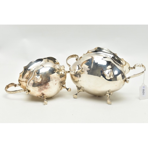 154 - AN EDWARDIAN SILVER TWIN HANDLED SUGAR BOWL AND MILK JUG OF BOMBÉ FORM, on four cabriole legs, maker... 