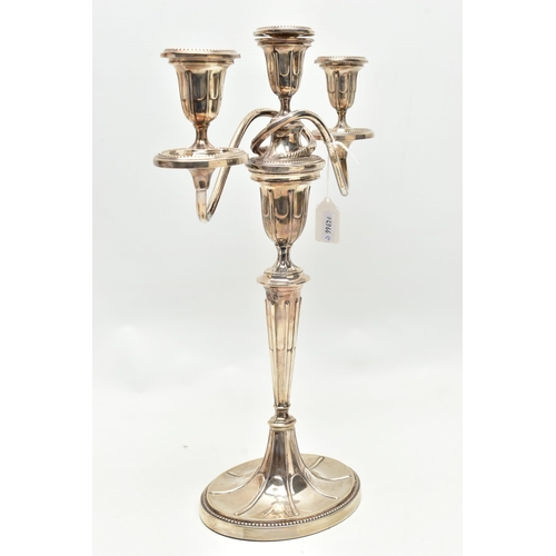 157 - A GEORGE V SILVER THREE LIGHT CANDELABRUM OF NEO-CLASSICAL STYLE, the oval removable sconces and dri... 